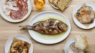 Manteca restaurant review | A selection of Manteca's dishes, including whole-grilled fish, the salumi plate, the clam flatbread and cocktails