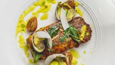 Seabass and mussels white wine and coconut curry at Benares in London