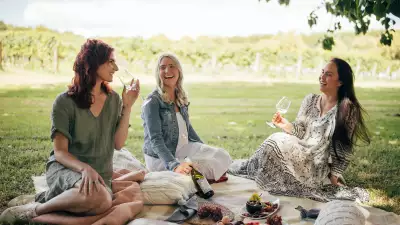 Friends enjoying a bottle of Villa Maria