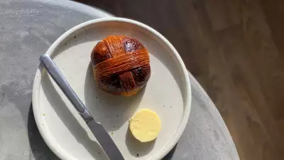 hot cross bun with a croissant cross top