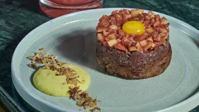 Ox Heart Tartar, Spiced Quince and a Cured Blue Hen Egg