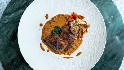 Chargrilled grouse breast with Archari spices, mustard greens and fenugreek