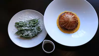 Smoked ham hock and Gruyere pithivier with seasonal greens, onion pur&eacute;e and red wine jus