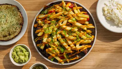Lomo saltado, scallion pancake, rocoto, pickled chillis and fries
