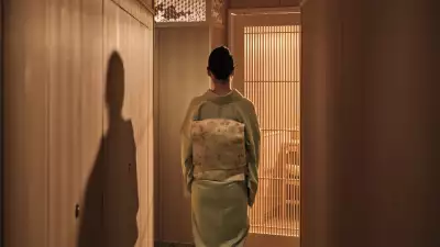 The host, or okami-san, trained in the art of the Japanese geisha