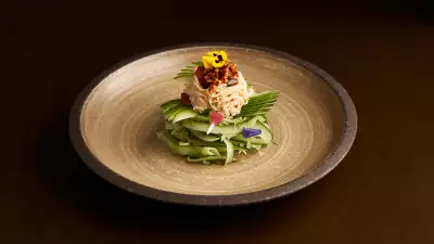 Sake steamed chicken breast and cucumber salad, umami chilli oil and goma-dare vinaigrette