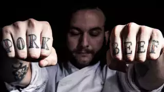 Leon Borja's tattooed knuckles