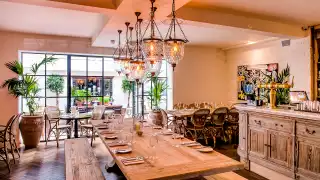 A large communal table at The Harcourt