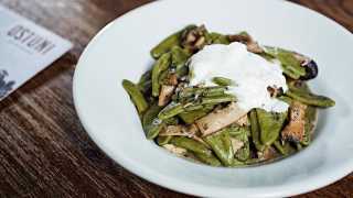 Green olive leaf pasta, topped with burrata, mushrooms and truffle