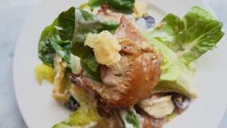 Quail with lettuce, smoked cheese, hazelnuts and grapes