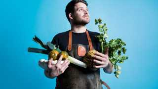 Tom Hunt with a selection of winter vegetables. Photograph by David Harrison
