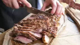 Tomahawk steak being sliced at Nutbourne