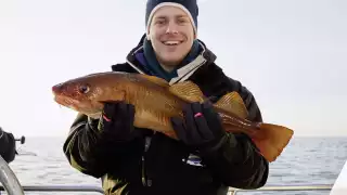 Mike Gibson with his catch – unfortunately not a Skrei