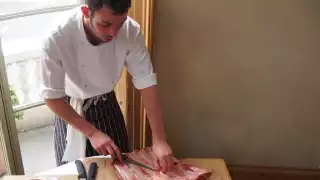 One of the Cubitt House collection's chefs expertly preparing a meal