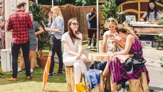 People relaxing in the sun at Taste of London