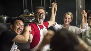 Massimo Bottura in the kitchen at the launch of one of his soup kitchens. Photograph by Simon John Owen