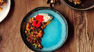 Chickpea salad with rose harissa, smoked hummus, sesame labneh and date syrup