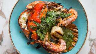 Roasted platter of British Isles shellfish with sea vegetables, herb and lemon
