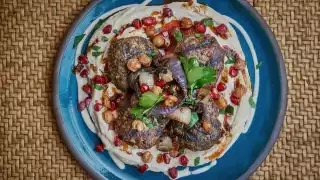 Beef and venison kofte on a bed of hummus and tahini