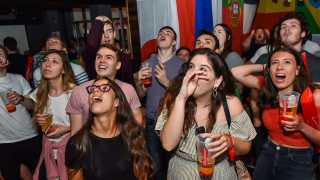 Fans celebrate at Belushi's sports bar
