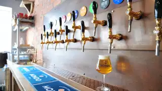 Beer taps at Mondo Brewing Company's tap room