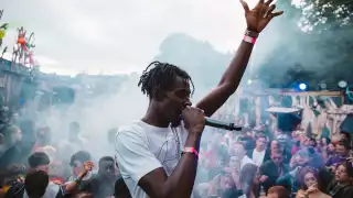 An artist at Standon Calling's Cowshed