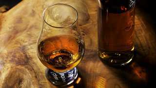 A crystal nosing glass for scotch whisky
