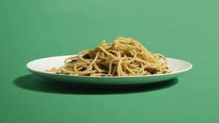 Spaghetti with anchovy, pine nuts, sultanas and wild fennel