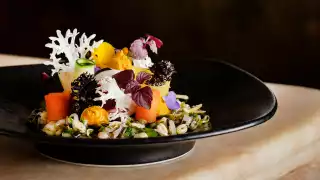 Raw pickled vegetable salad, carrot hummus and smashed grains