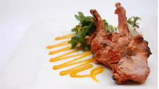 Clove smoked lamb chops with garlic yoghurt at Babur