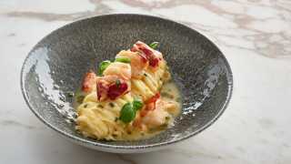 Lobster with angel hair pasta and shellfish sauce