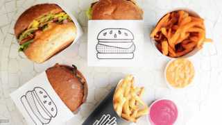 best places to eat vegan food in london, vegan burgers, fries, ketchup and aioli from by Chloe.