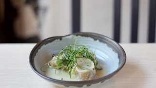 Pork dumplings in broth with celeriac and Tottenham horseradish