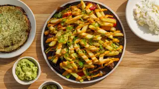 Lomo saltado, scallion pancake, rocoto, pickled chillis and fries