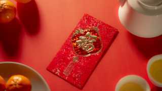 Chinese New Year still life with red envelope Ang Pao