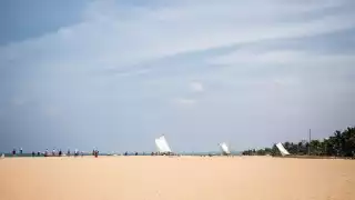 A traditional Sri Lankan outrigger sailboat