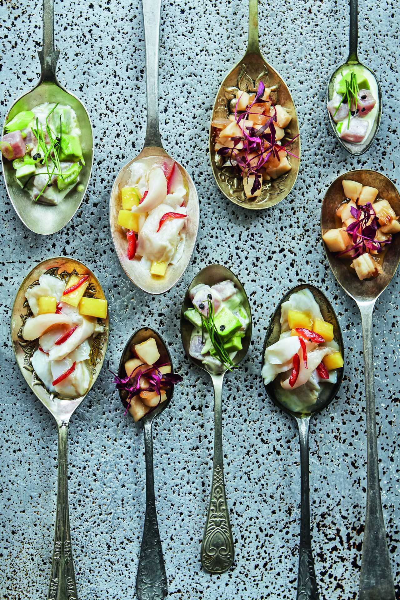 Tasty canapés on spoons