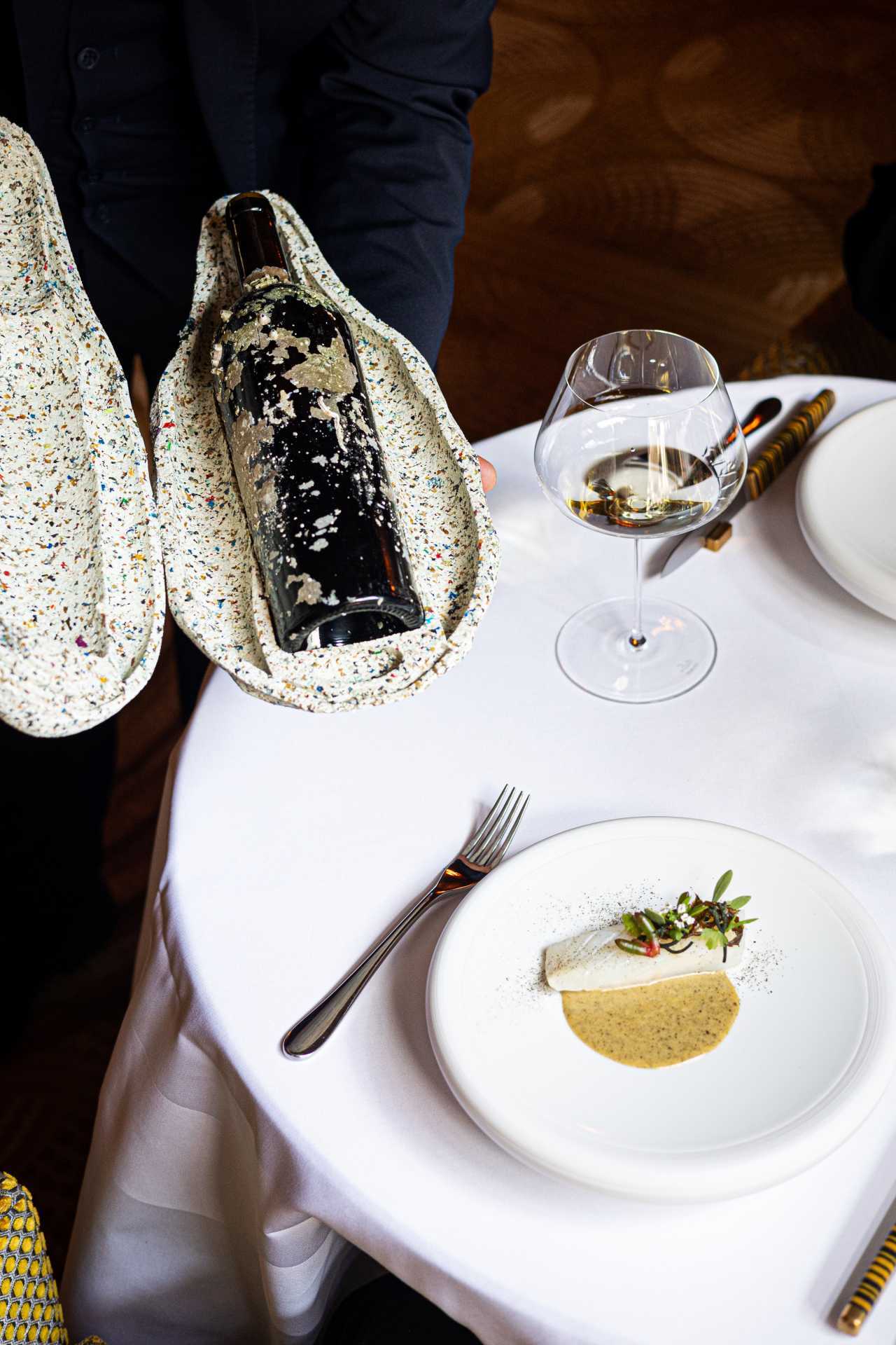 Bottles delivered to the table at Restaurant 1890