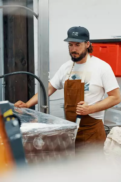 Tom tending to his sake