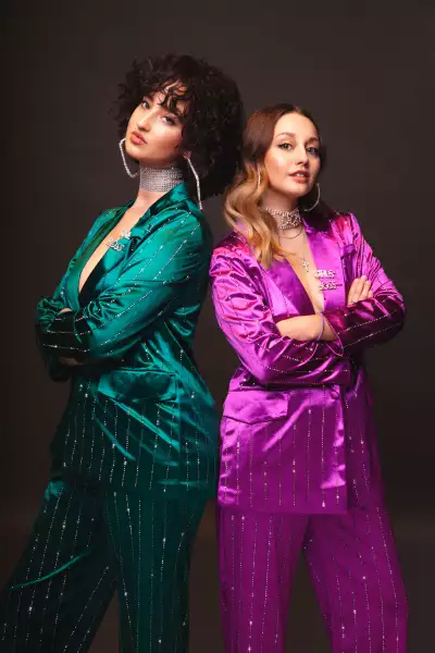 Mam Sham's Maria K Georgiou and Rhiannon Butler in sparkly suits