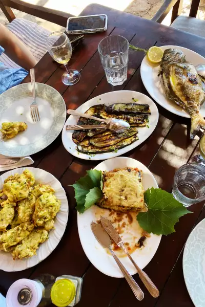 Aubergine pie, zucchini fritters and grilled zucchini at Konoba Dionis in the Pakleni Islands