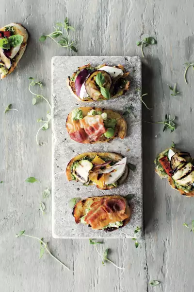 Canap&eacute;s displayed on a slab