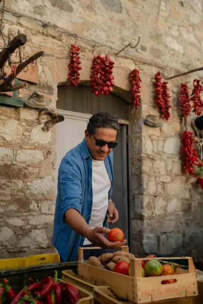 Francesco Mazzei at food market in Calabria