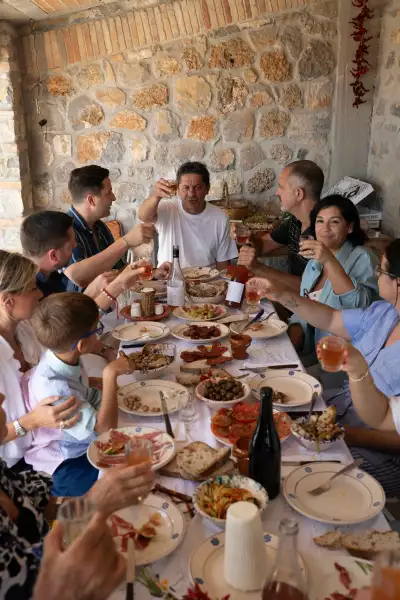 Francesco Mazzei and family with Calabrian feast