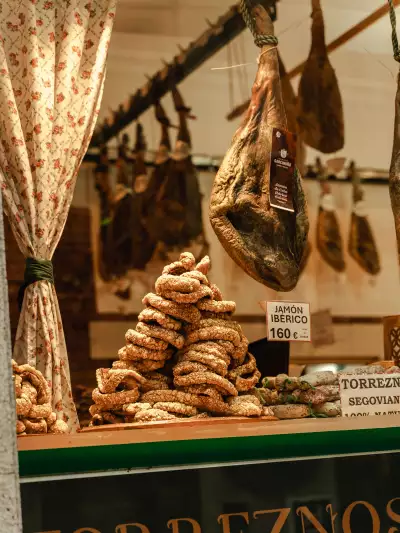 Jam&oacute;n sitting in a shopfront window