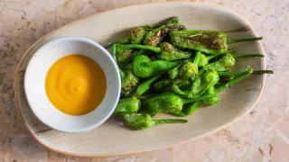Blistered padrón peppers at Rambla in Soho