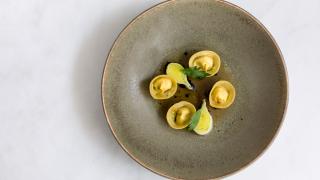 Smoked chicken tortellini cooked in truffle butter at Stem