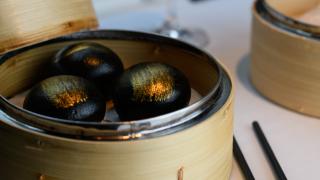 Steamed charcoal buns with custard