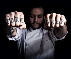 Leon Borja's tattooed knuckles closeup