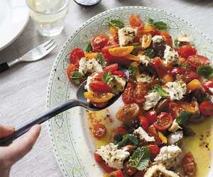 Anna Jones' traffic light tomatoes with oven-roasted feta